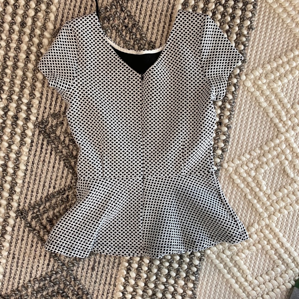 Polka dot peplum top